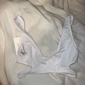 White bikini top never worn with tags. Size small